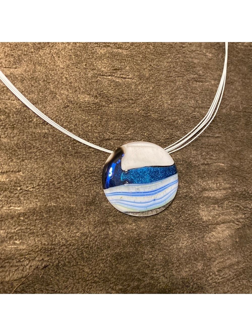 Locally crafted glass art. Glass on necklace.